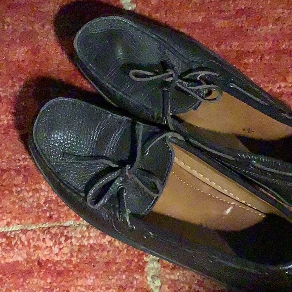 Dark brown leather driving mocassins.